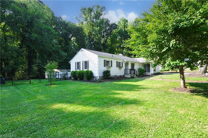 Property Photo:  3801 Parkwood Drive  NC 27403 