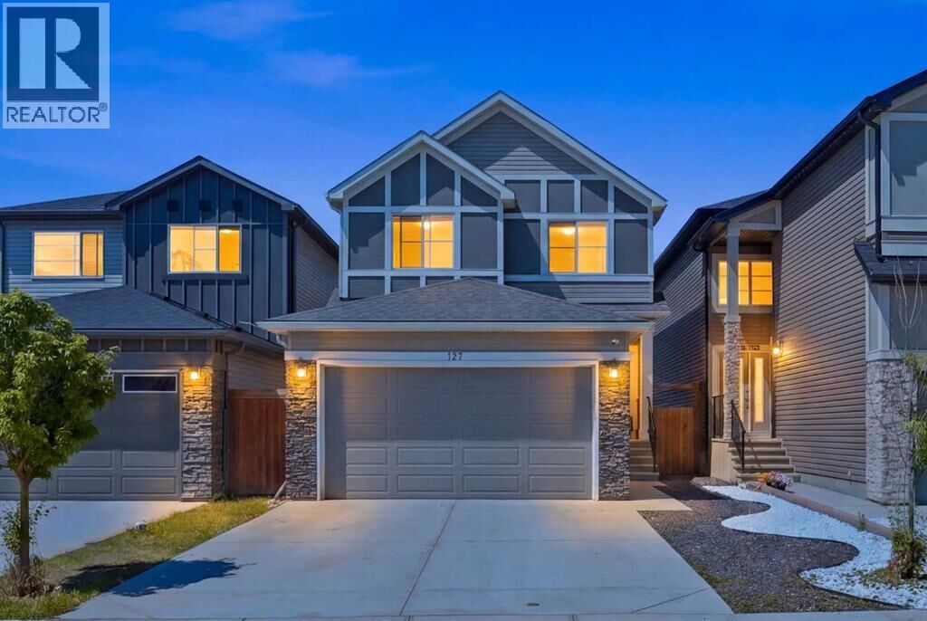 Property Photo:  107 Savanna Way Northeast  AB T3J 0Y6 
