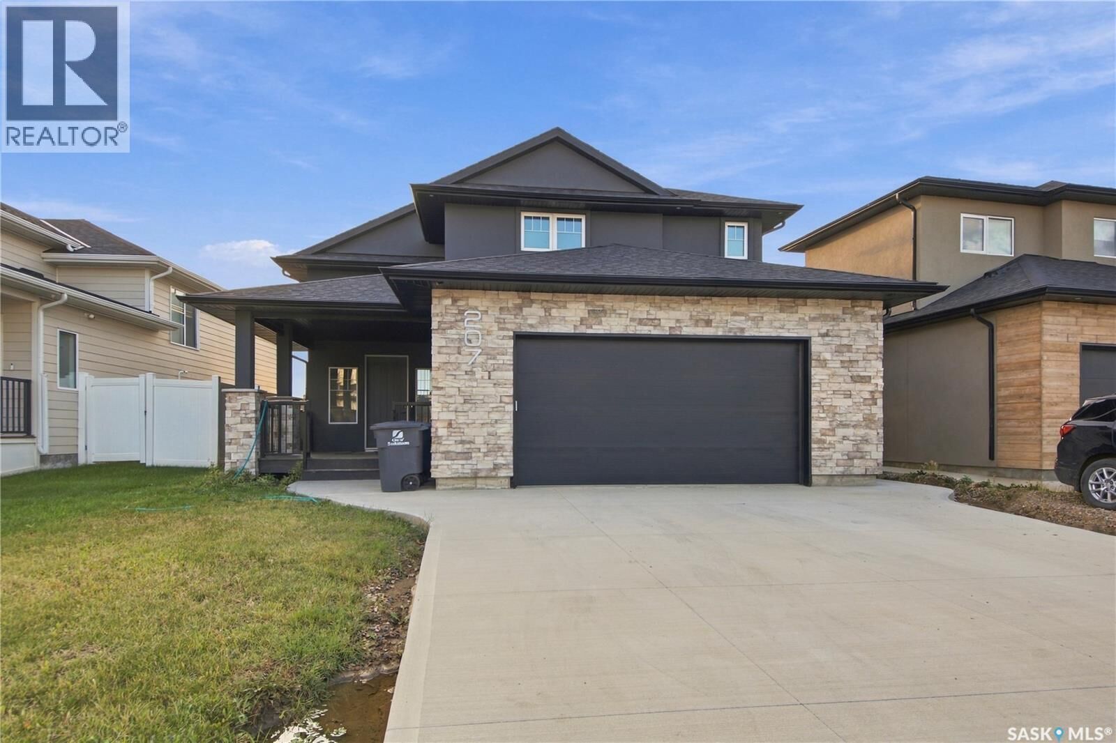 Property Photo:  207 Greyeyes-Steele Way  SK S7V 0M6 