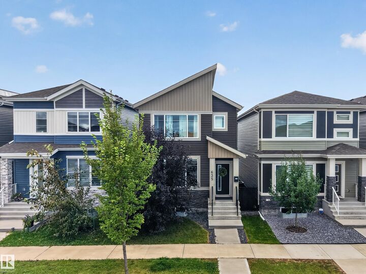 Property Photo:  635 Meadowview Drive  AB T8L 0X2 