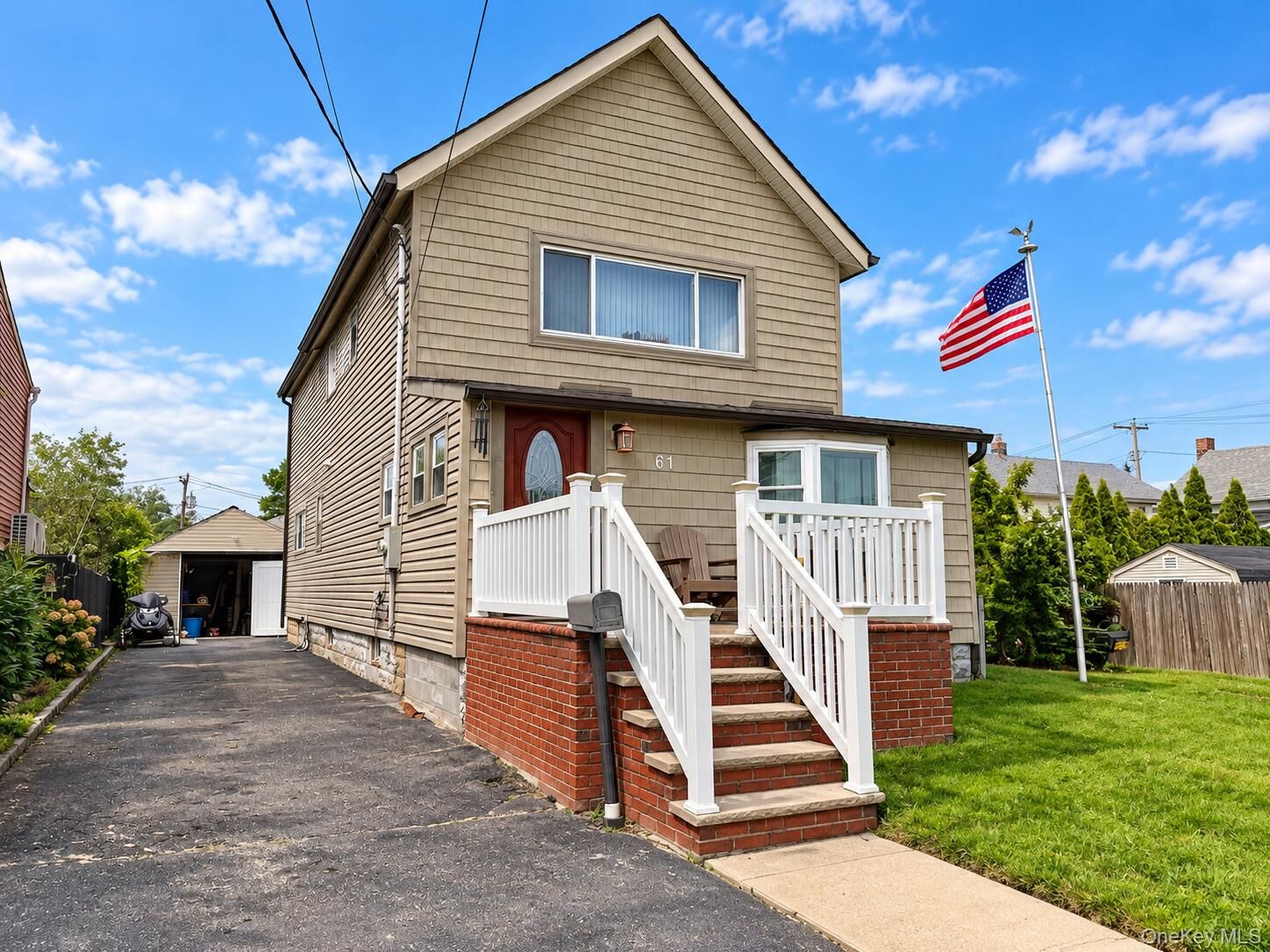 Property Photo:  61 5th Avenue  NY 11518 