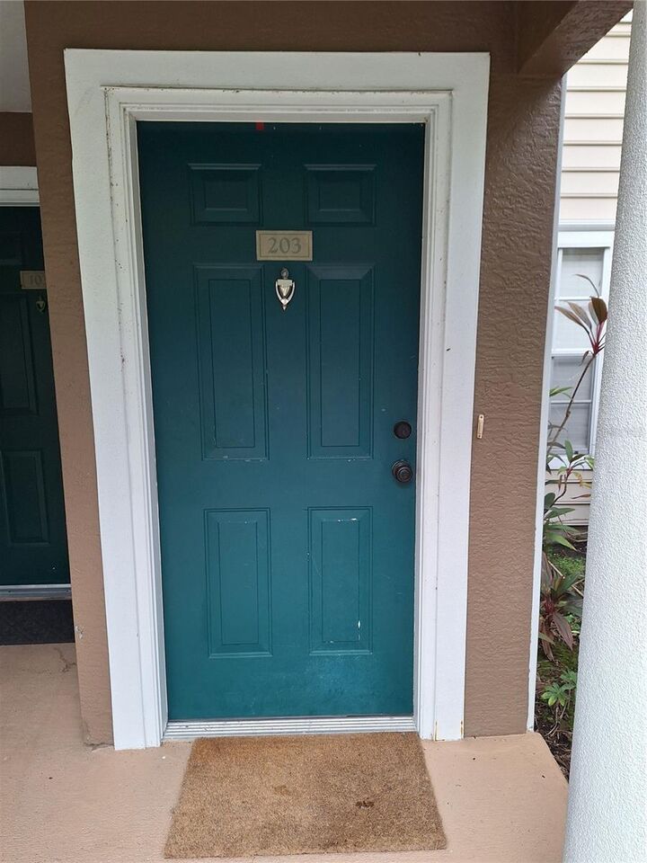 Property Photo: 8809 Manor Loop 203 FL 34202