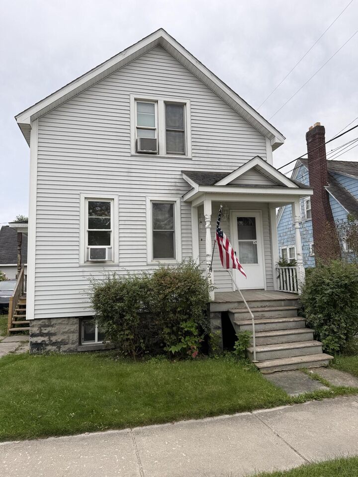 Property Photo:  210 S 7th Avenue  MI 49707 