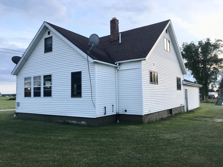 Property Photo:  7338 M-129  MI 49774 