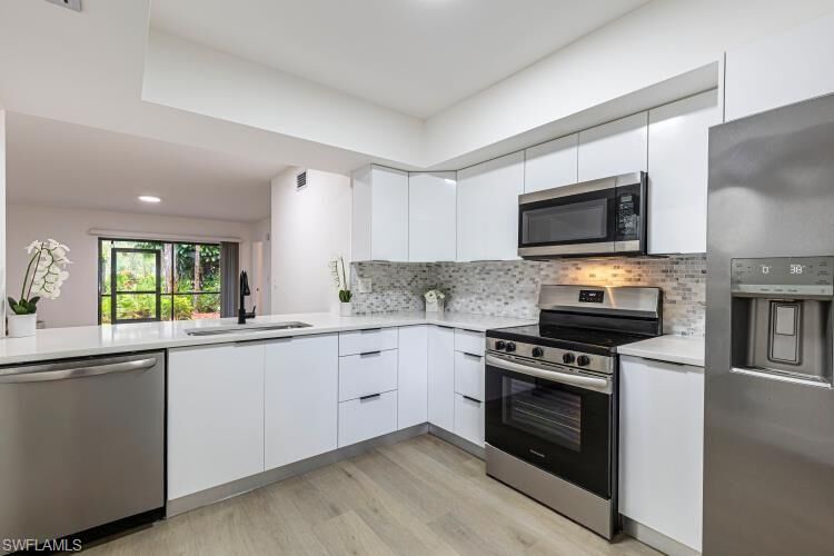 Property Photo:  1765 Courtyard Way 103  FL 34112 