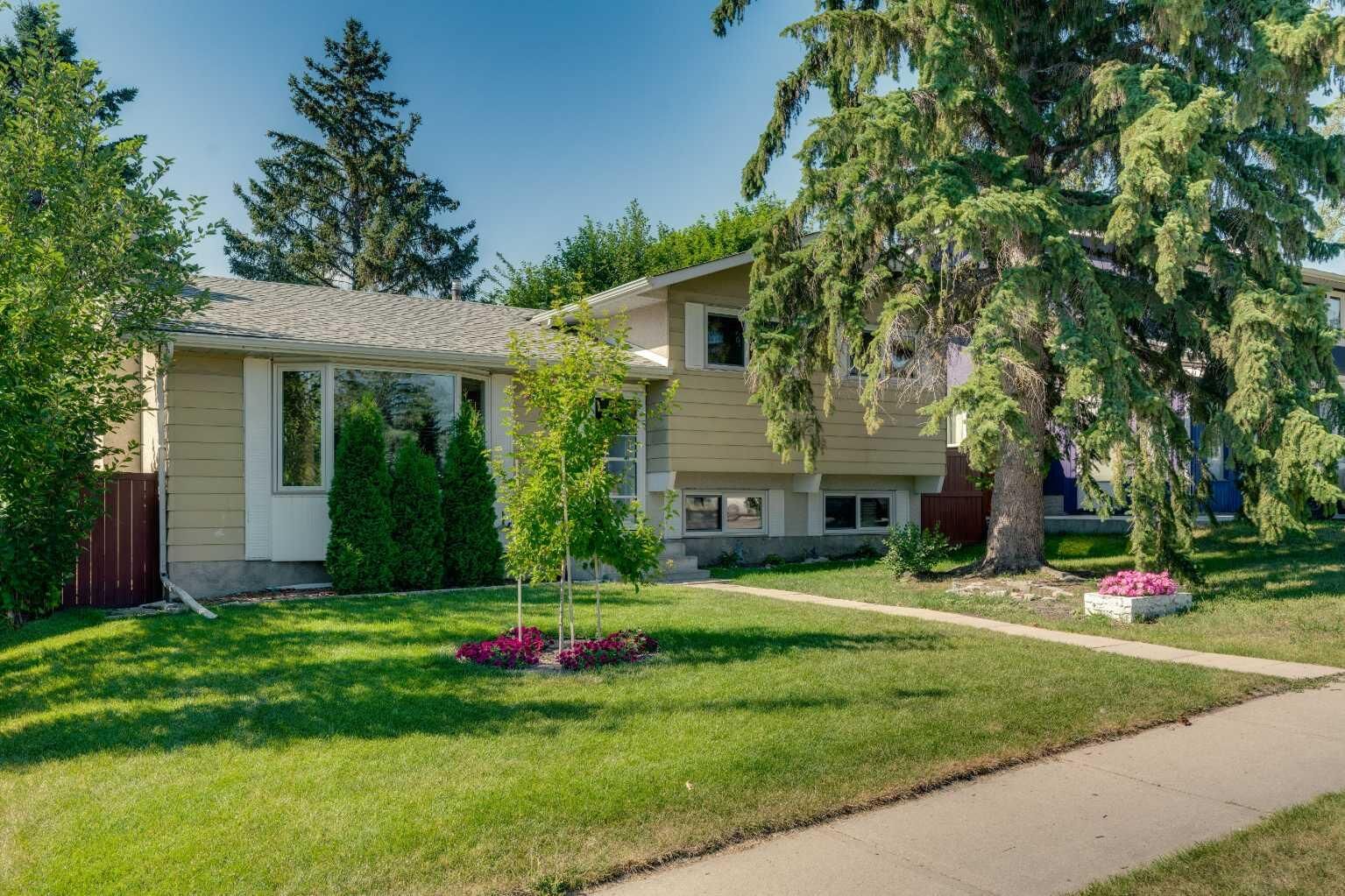 Property Photo:  335 Queensland Drive SE  AB T2J 3R6 