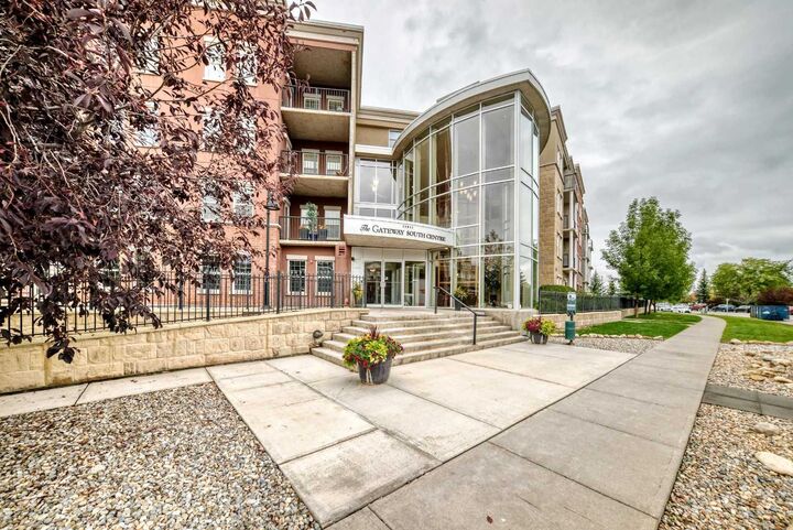 Property Photo:  11811 Lake Fraser Drive SE 4203  AB T2J 1J7 