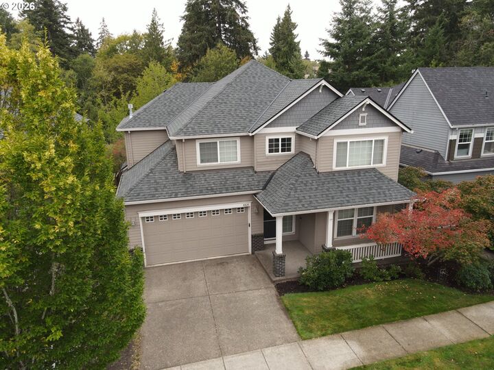 Property Photo:  665 NE Retford Ave  OR 97124 