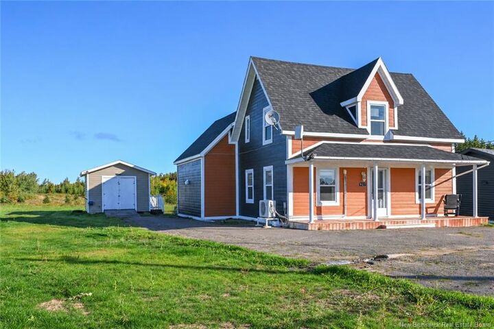 Property Photo:  927 Paquetville Road  NB E8R 1E7 