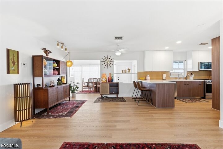 Property Photo:  8071 San Carlos Boulevard  FL 33967 
