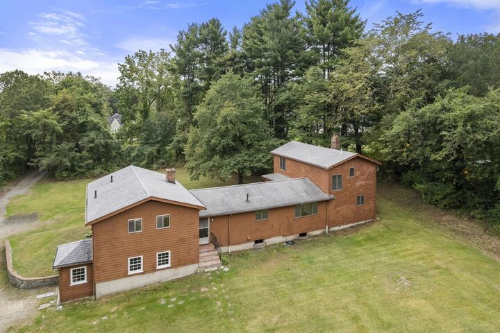 Property Photo: 444 Clapboardtree Street MA 02090