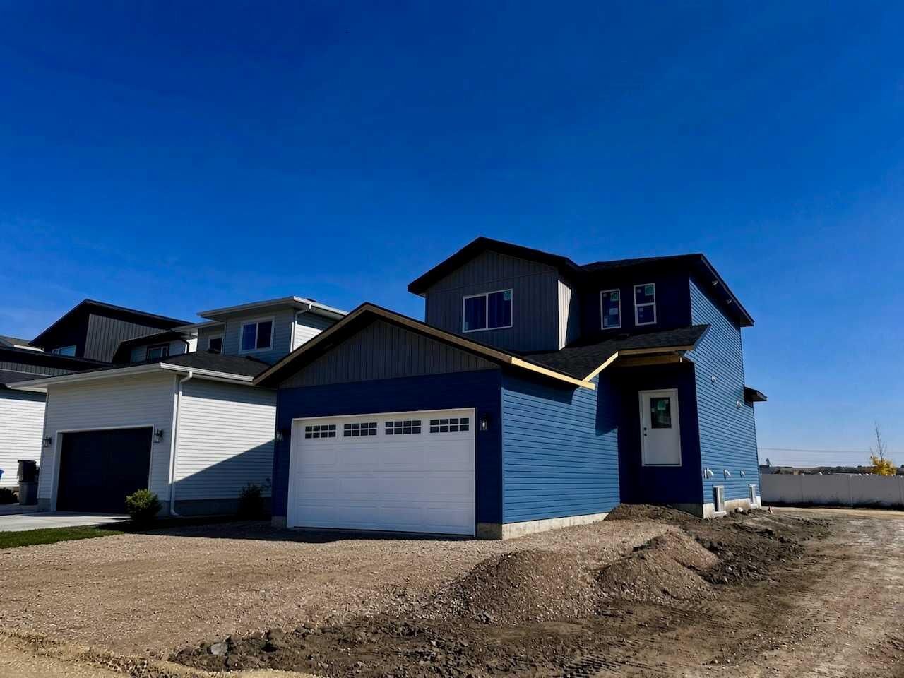 Property Photo: 114 Norseman Close AB T4G 0G5