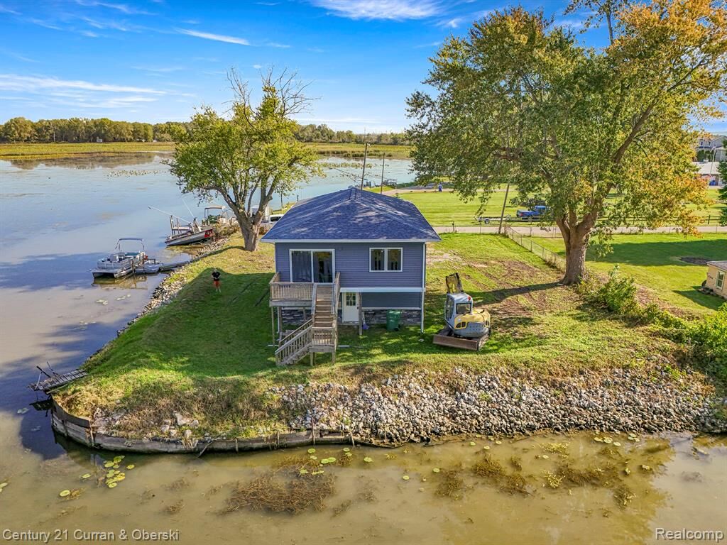 Property Photo:  6809 Lakeshore Drive  MI 48166 