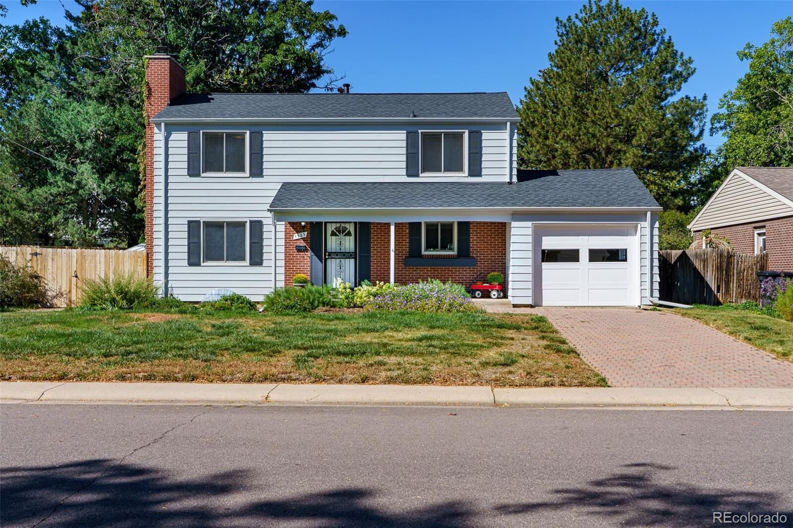 Property Photo:  1983 S Leyden Street  CO 80224 