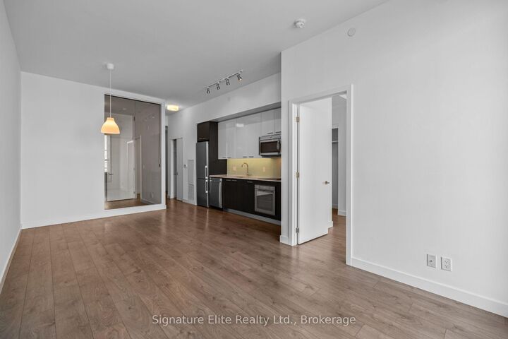 Property Photo:  1075 Queen Street E 204  ON M4M 1K3 