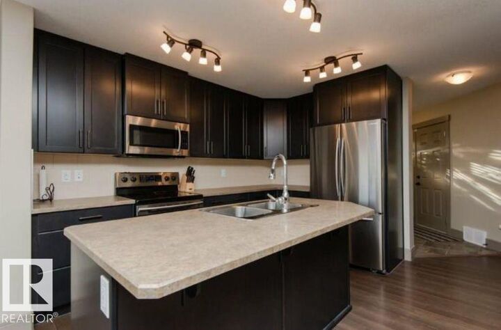 Property Photo:  7233 Armour Crescent SW  AB T6W 2S1 