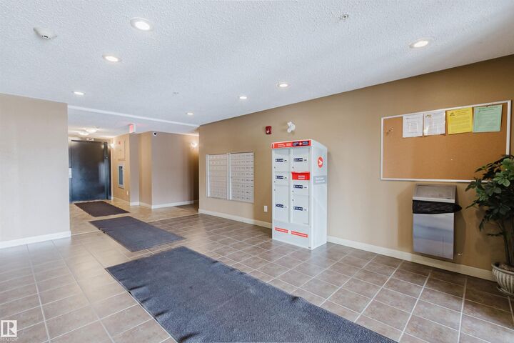 Property Photo:  11803 22 Avenue SW 204  AB T6W 2R9 