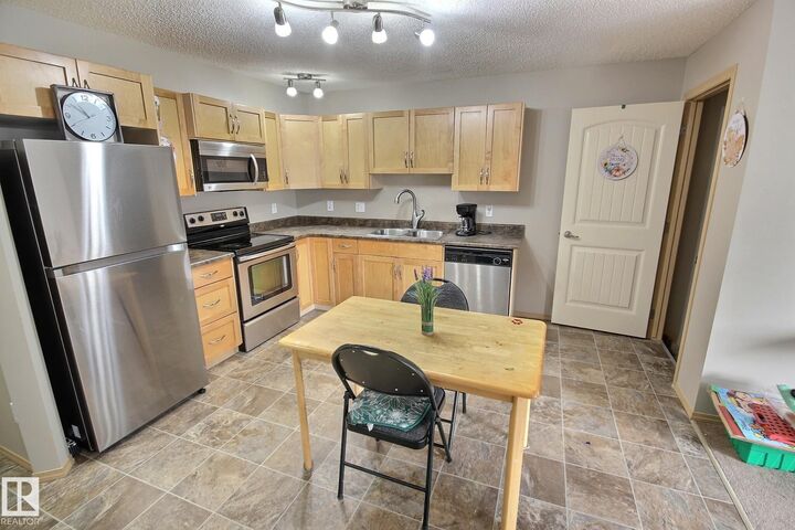 Property Photo:  604 62 Street SW 16  AB T6X 0K4 