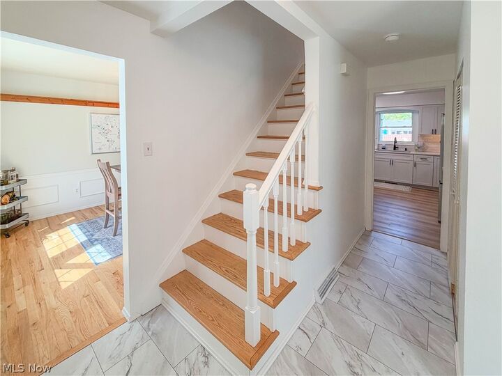 Property Photo: 8475 Squirrel Hill Drive NE OH 44484