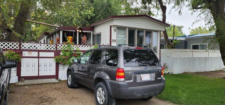 Property Photo:  59 Greenbrook  Mobile Village  AB T1R 0R7 