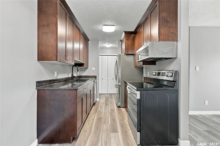 Property Photo:  2233 St Henry Avenue 210  SK S7M 5K6 