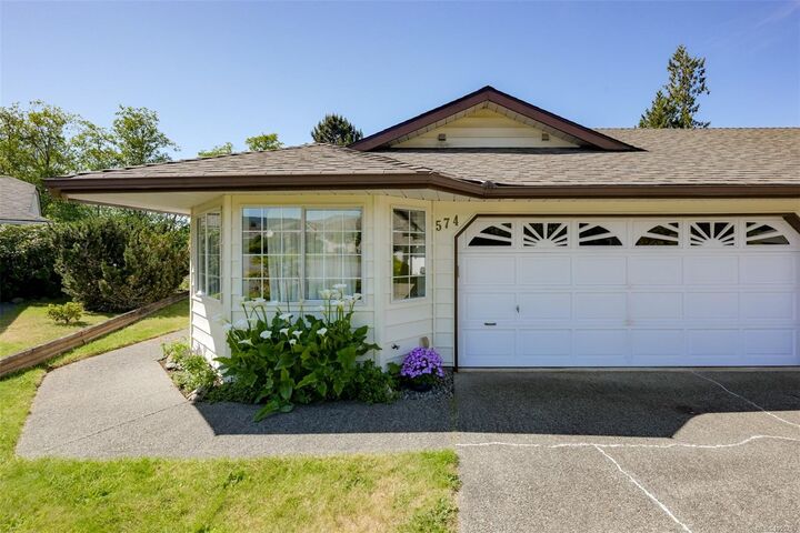 Property Photo:  574 Cedar Cres  BC V8H 0K8 