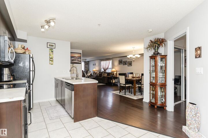 Property Photo:  10118 106 Avenue NW 107  AB T5H 0B8 
