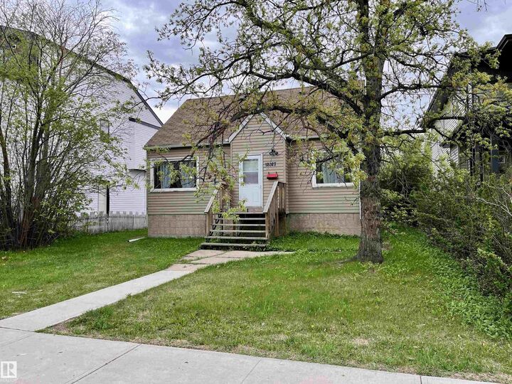Property Photo:  12027 124 Street NW  AB T5L 0M8 
