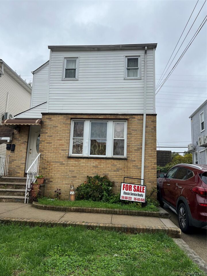Property Photo:  228-50 Mentone Avenue  NY 11413 