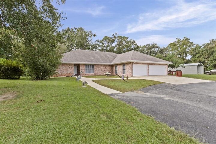 Property Photo:  22996 Miflin Road  AL 36535 