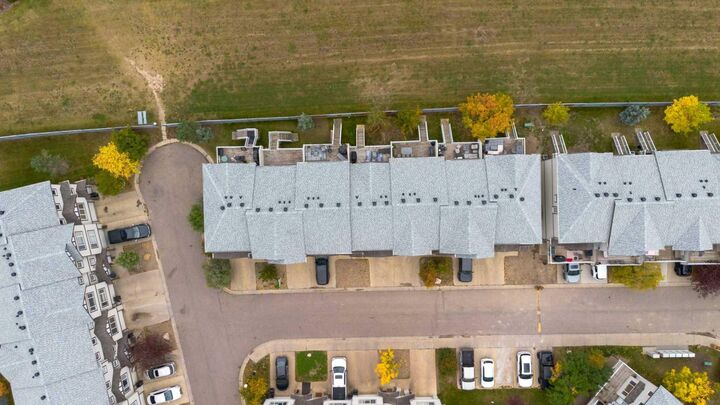 Property Photo: 240 Laffont Way 38 AB T9K 2W2
