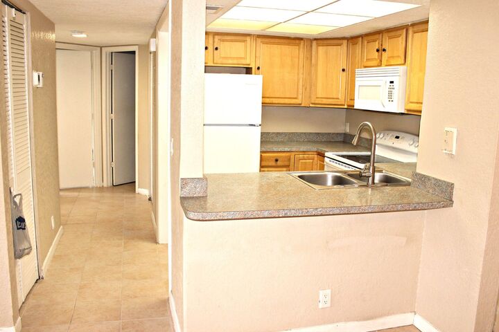 Property Photo: 1500 SE Royal Green Circle 102 FL 34952