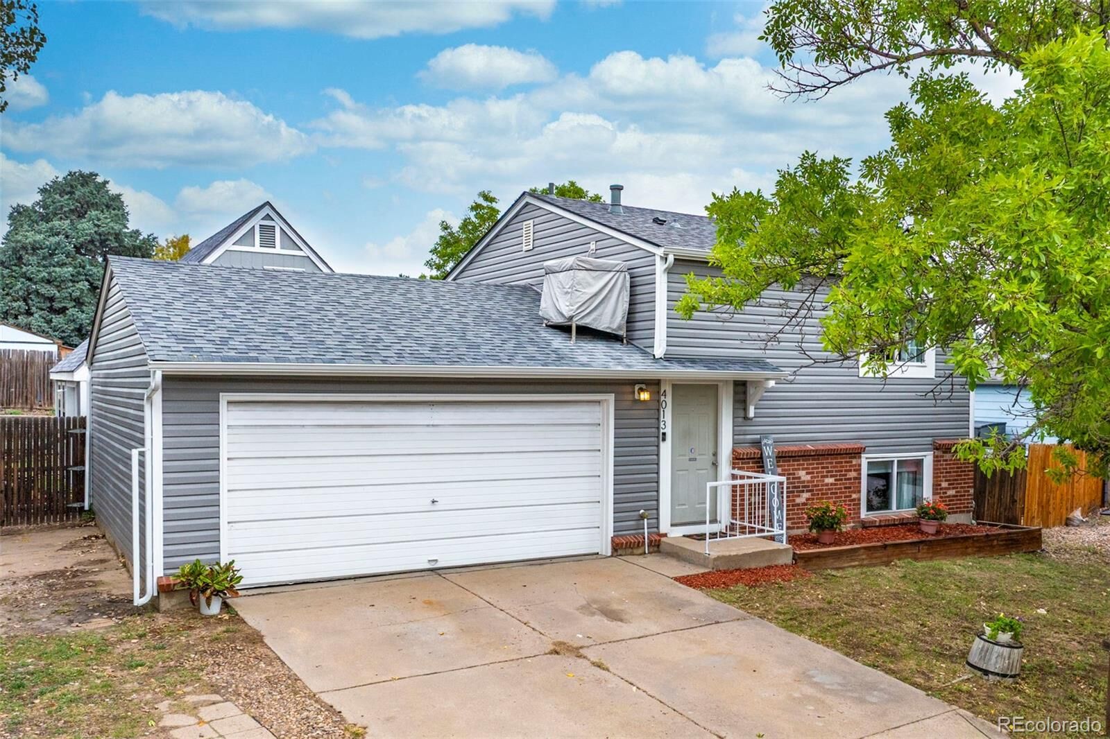 Property Photo:  4013 S Quintero Way  CO 80013 