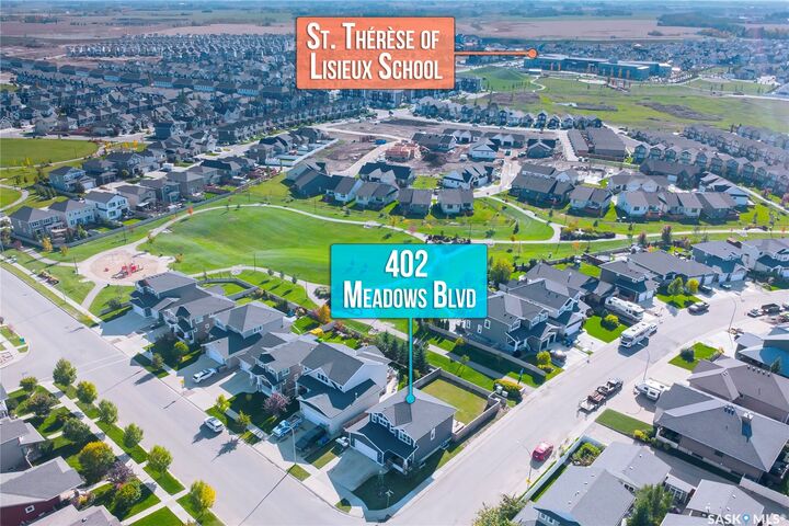 Property Photo:  402 Meadows Boulevard  SK S7V 0E7 
