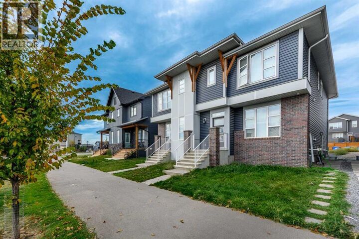 Property Photo:  20913 Main Street Southeast  AB T3M 3M1 