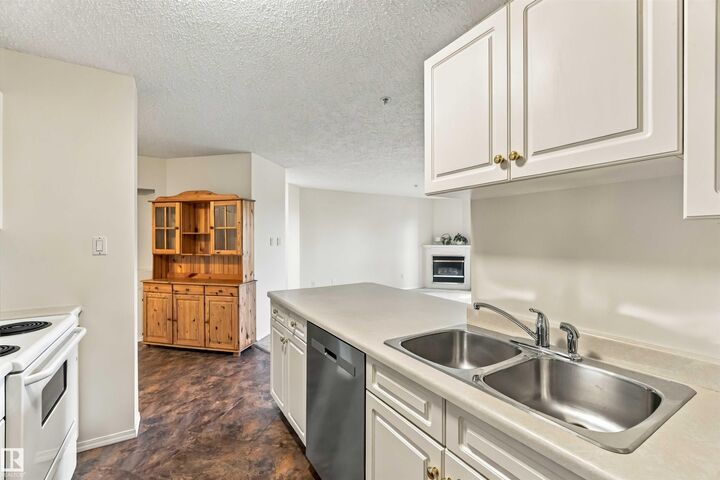 Property Photo: 10511 42 Avenue NW 205 AB T6J 7G8
