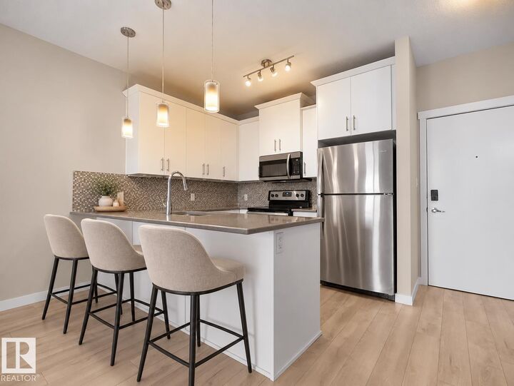 Property Photo:  812 Welsh Drive SW 304  AB T6X 1Y7 