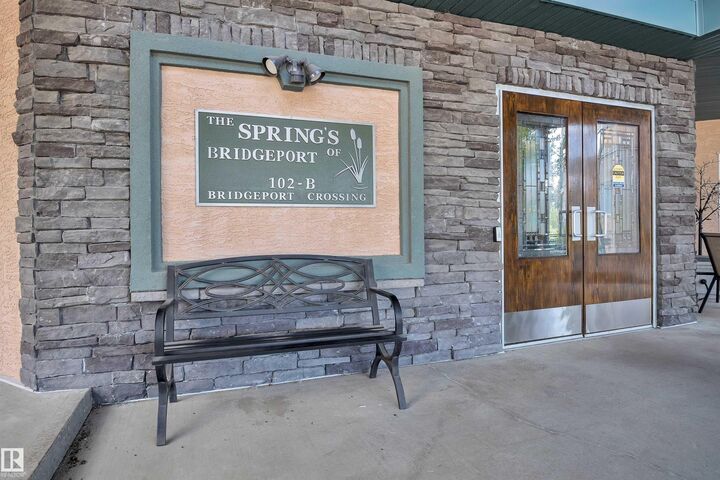 Property Photo:  102B Bridgeport Crossing 210  AB T9E 8K8 
