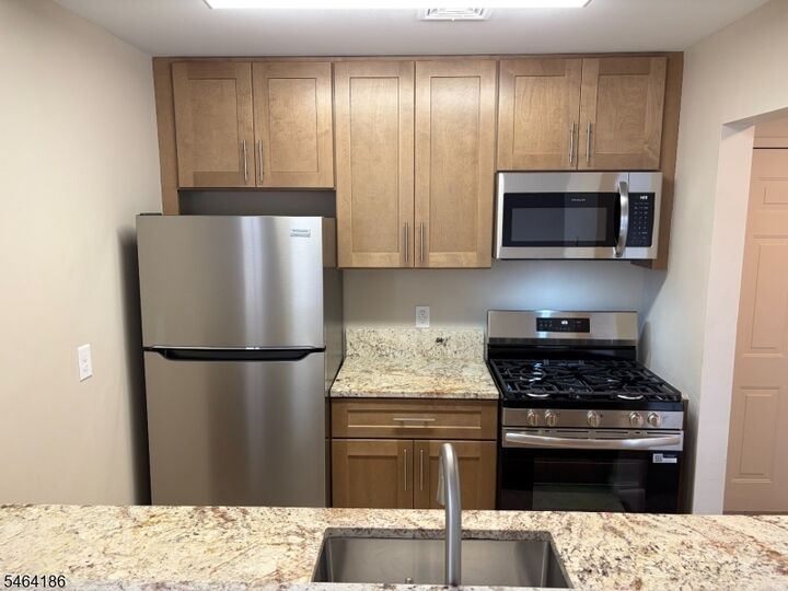 Property Photo: 65 E Milton Avenue G NJ 07065