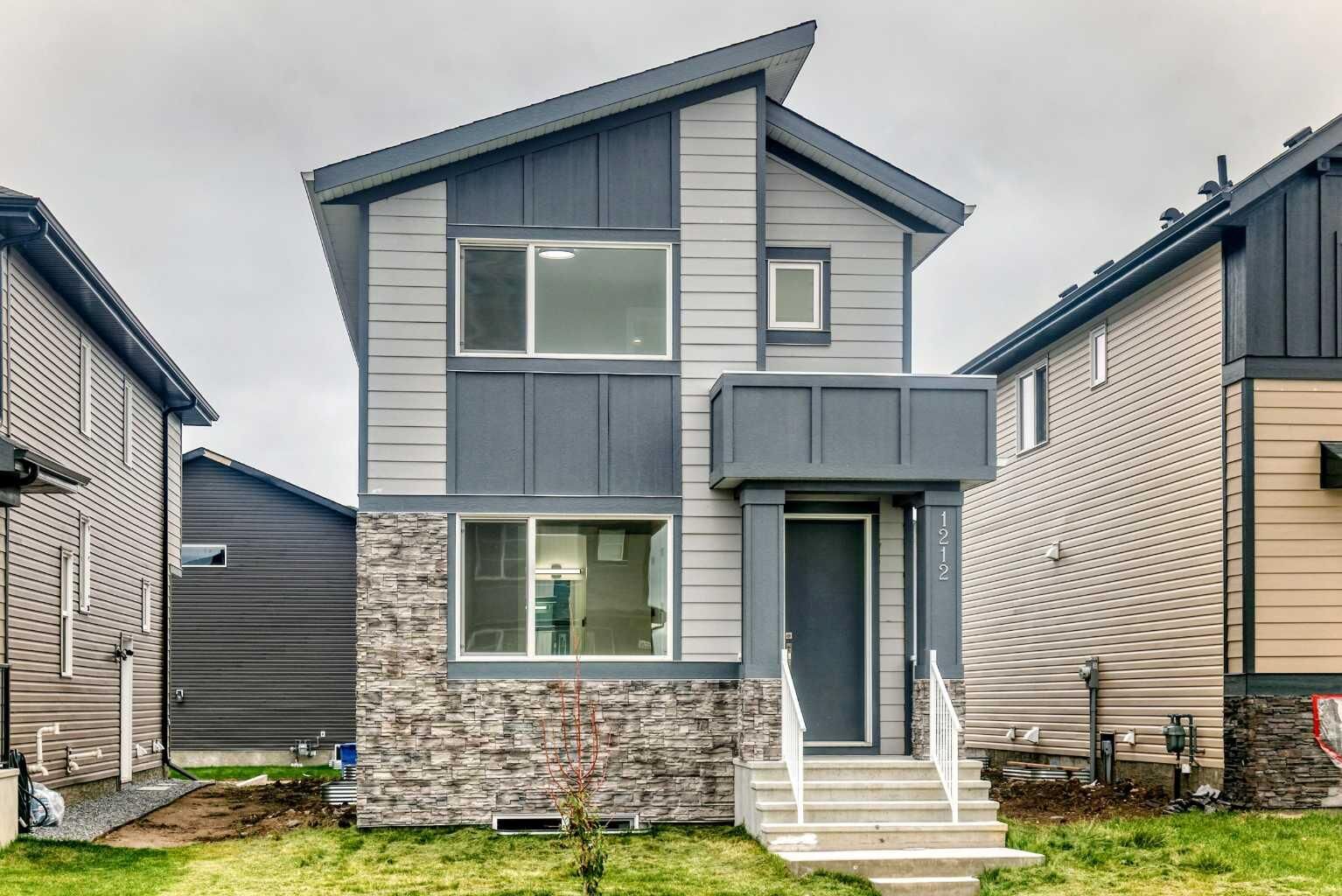 Property Photo:  1212 Waterford Drive  AB T1X 3A1 