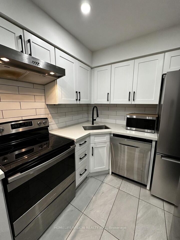 Property Photo:  473 Cosburn Avenue Apt.  A  ON M4J 2N6 