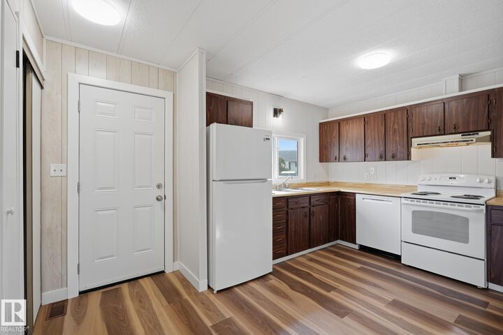 Property Photo: 119 Parkland Acres AB T4L 1S8