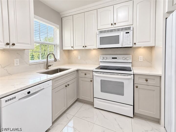 Property Photo:  501 Forest Lakes Boulevard 212  FL 34105 