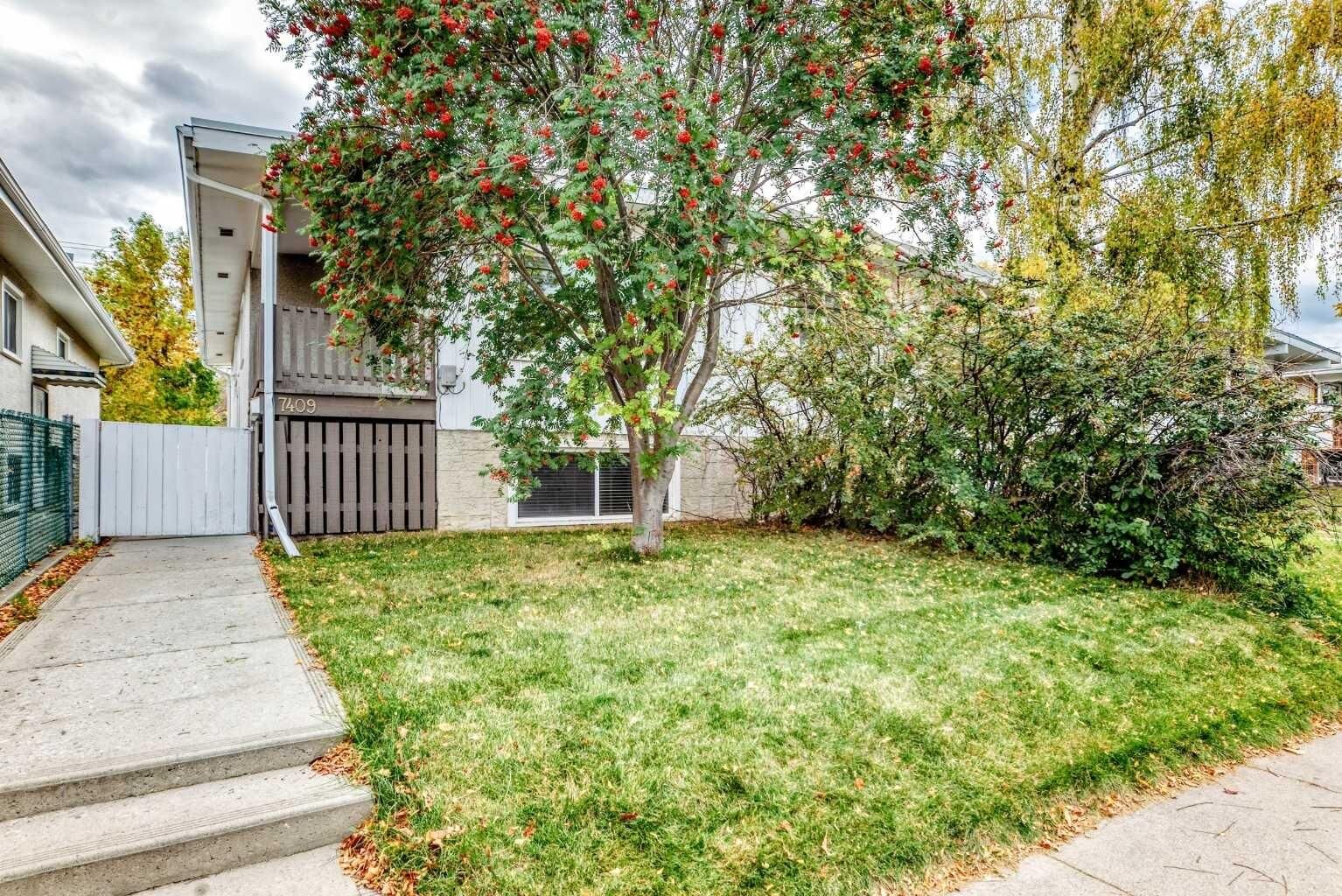 Property Photo:  7409 37 Avenue NW  AB T3B 1W8 