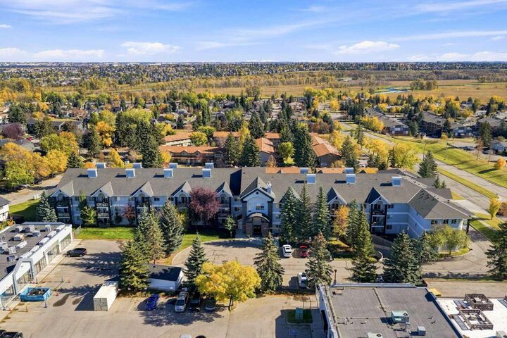 Property Photo: 2022 Canyon Meadows Drive SE 220 AB T2J 7H1
