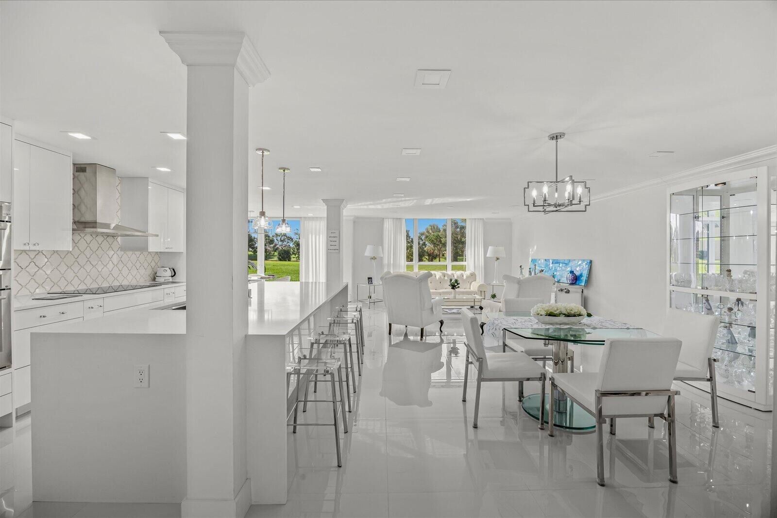 Property Photo:  5390 Woodland Lakes Drive 105  FL 33418 