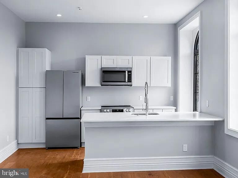 Property Photo:  1100 W Lafayette Avenue 5  MD 21217 