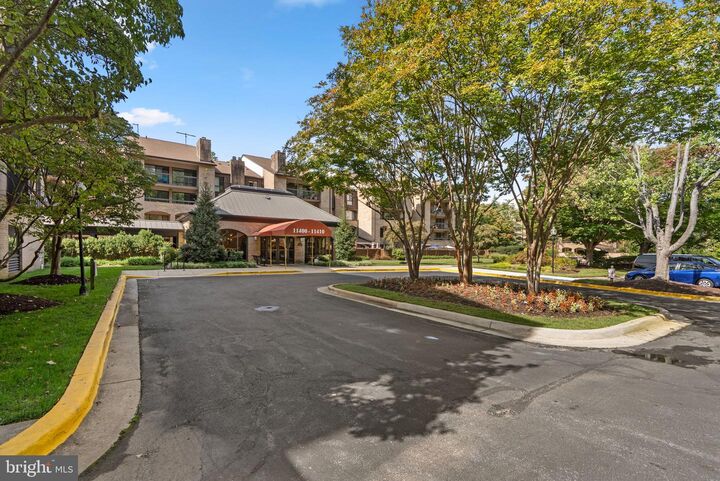 Property Photo:  11410 Strand Drive R-207  MD 20852 