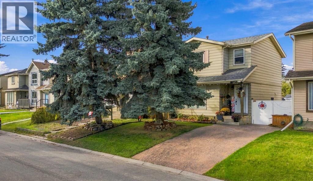 Property Photo:  17 Erin Ridge Road Southeast  AB T2B 2W2 