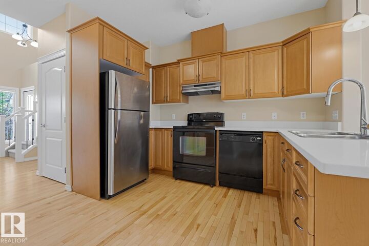 Property Photo:  11612 11 Av SW  AB T6W 1W8 